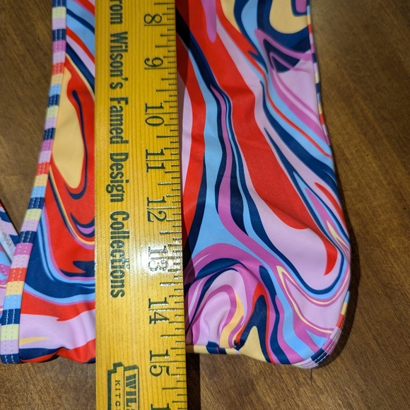 Vibrant Red and Blue One Piece with Artistic Swirls - Picture 4 of 7